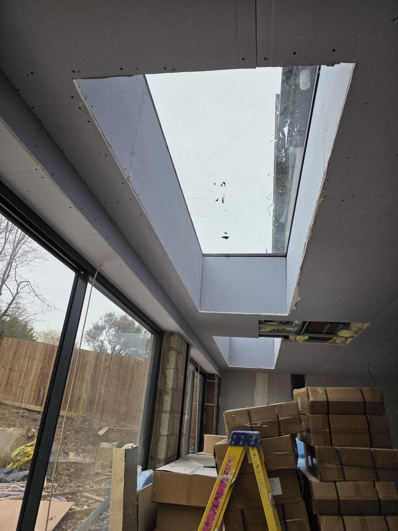 Plasterboard ceiling and skylight linings installed during a North London drylining project