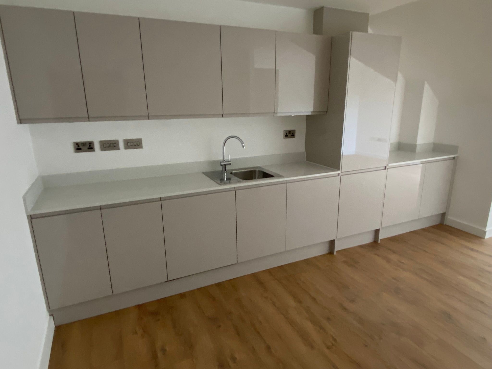 Completed modern linear kitchen installation